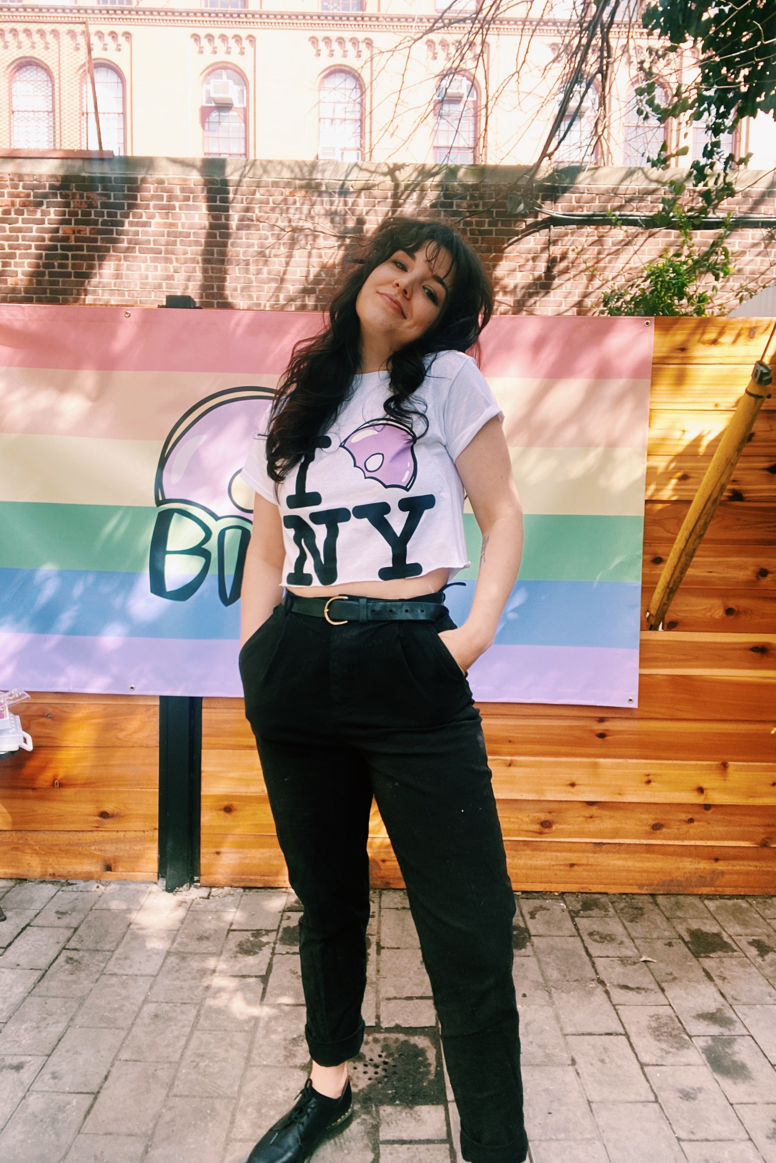 queer owned mini donut bakery in brooklyn nyc selling baked, artisan, custom, mini donuts and merchandise like aprons, hats, and t-shirts. custom dessert catering nyc the gay donut 